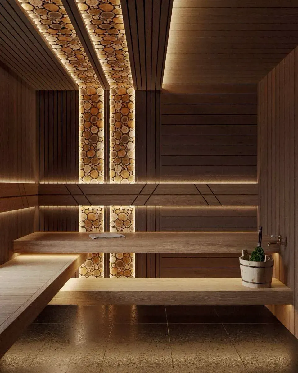 Домашняя сауна из липы внутри дома с LED-подсветкой за спинками и панелью из гималайской соли